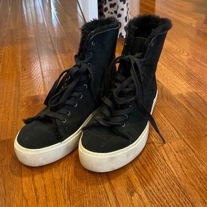 Super comfy Ugg Hugh top sneaker.  Fur on inside.